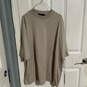 Brand new with tags Essentials brand tshirt